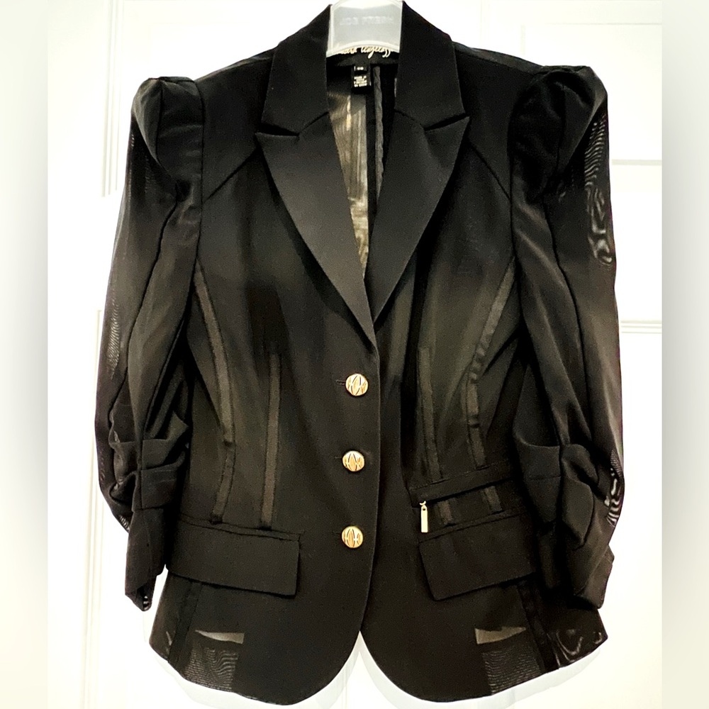 Sandra Augelozzi black jacket, double shoulder pads, gold buttons